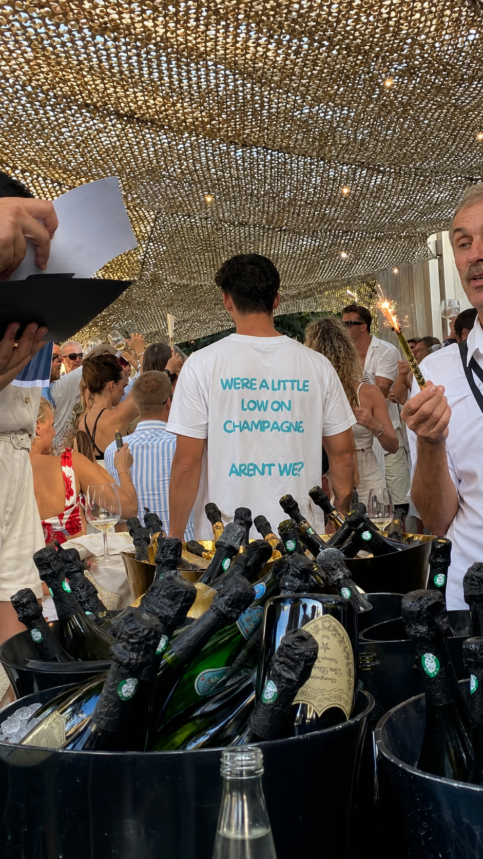 WE'RE A LITTLE LOW ON CHAMPAGNE, AREN'T WE ?